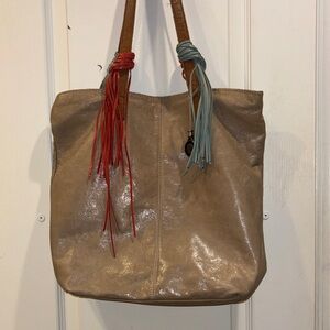 THE SAK… BEIGE LEATHER TOTE WITH LIGHT BLUE AND CORAL COLORED FRINGE ACCENTS
